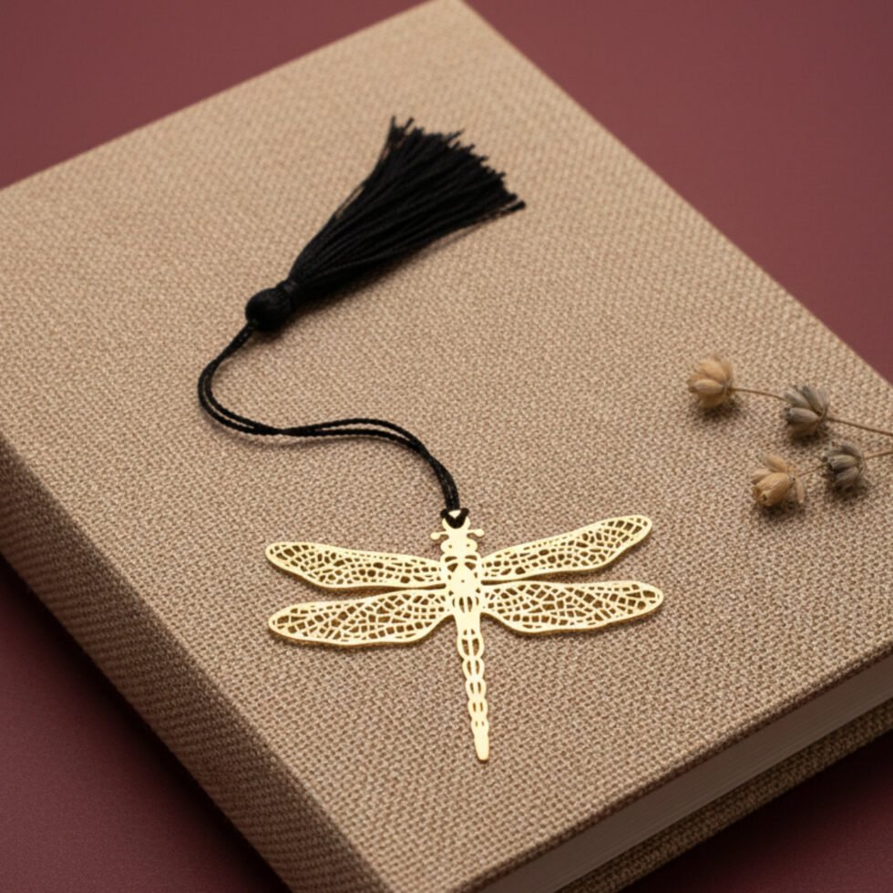 Dragonfly brass bookmark on maroon book warm tone aesthetic metal bookmark unique gift Indian gifts