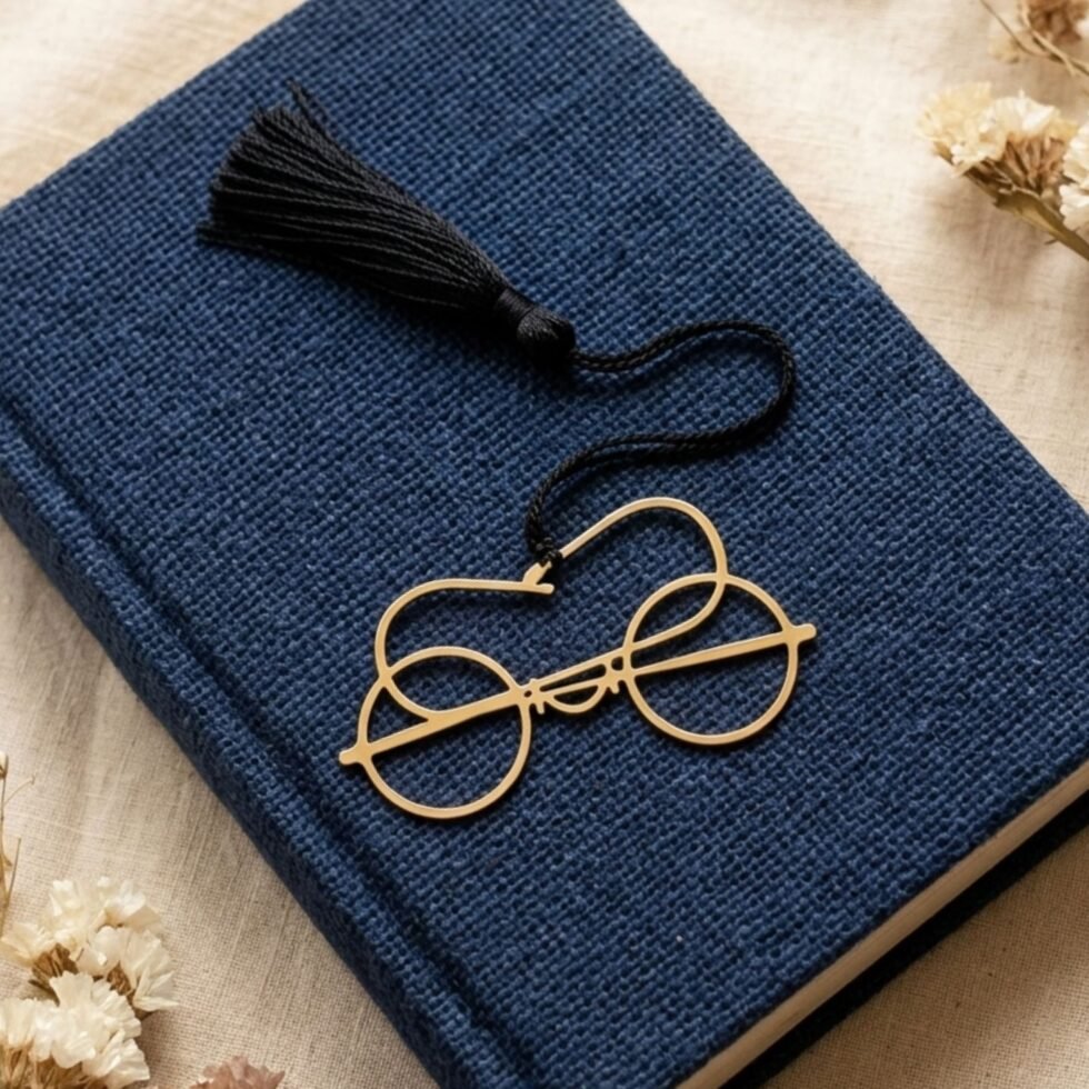 Gold plated Gandhi bookmark on navy jute book with dried flowers, unique Indian gift for book lovers